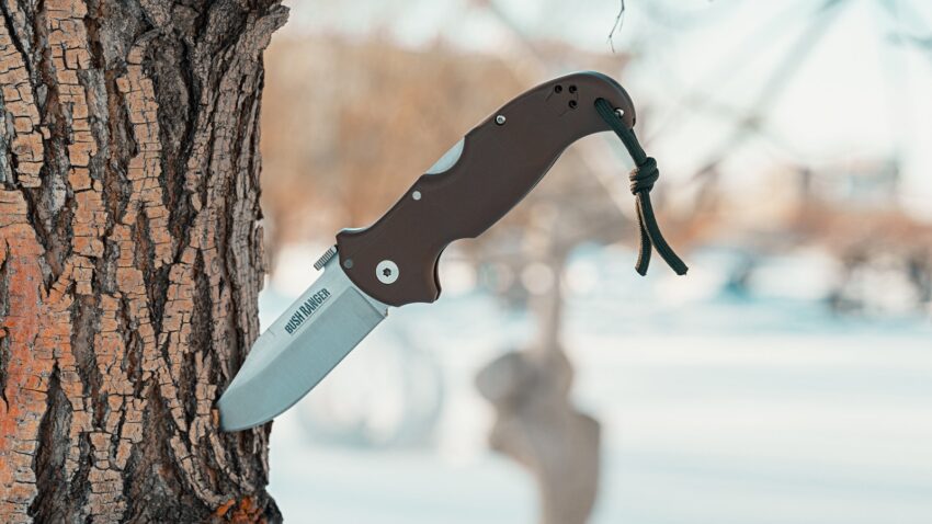 black and silver folding knife